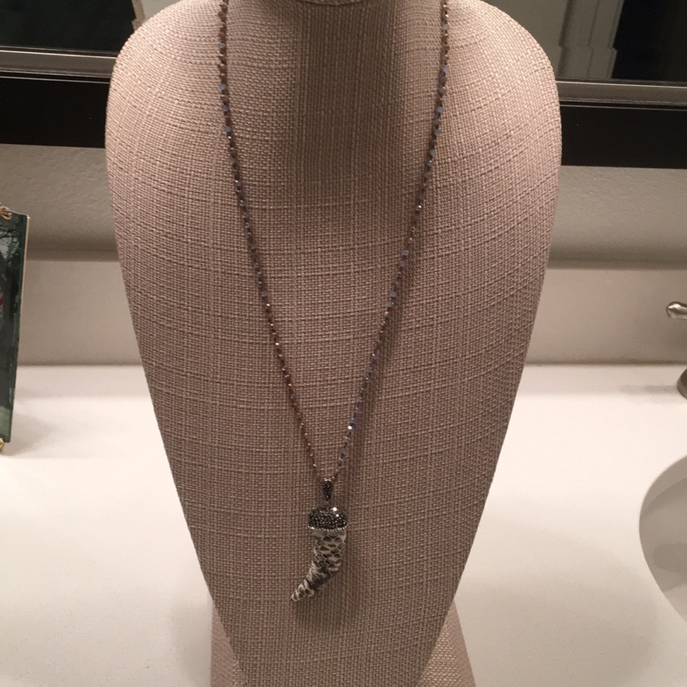 Long beaded leather tooth necklace